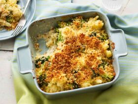 Roasted Broccoli and Cauliflower Pasta Bake: The Ultimate Comfort Food 34 overhead shot of golden bubbly roasted broccoli and cauliflower pasta bake in ceramic baking dish with melted cheese on top
