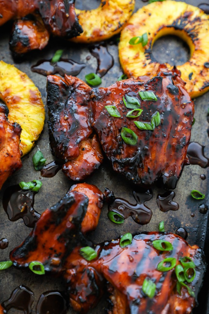 Huli Huli Chicken — Hawaiian Sweet Pineapple BBQ Glaze Recipe 28 Close-up of Huli Huli Chicken caramelized glaze with charred grill marks served with steamed rice and fresh pineapple garnish