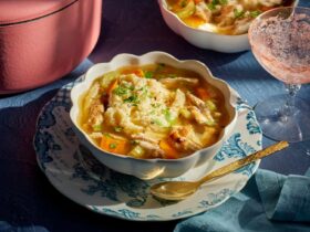 Chicken and Dumplings — The Ultimate Cozy Comfort Bowl That Nourishes Body and Soul 37 A steaming bowl of homemade chicken and dumplings with fluffy dumplings and tender shredded chicken in a rich golden broth, garnished with fresh parsley