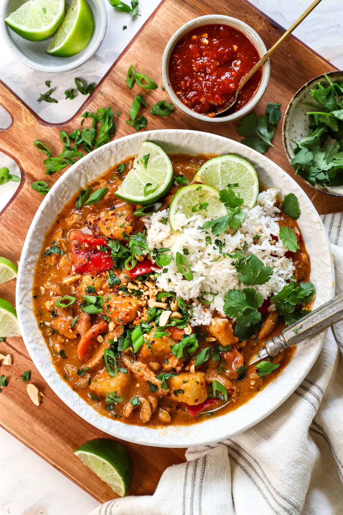 Faux-Massaman Vegetable Curry — Rich, Warming & Deeply Satisfying 26 Faux-Massaman Vegetable Curry served over jasmine rice in a wide bowl, garnished with fresh lime and cilantro, golden coconut broth visible