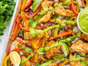 Sheet Pan Chicken Fajitas — The Easy, Healthy One-Pan Taco Night Winner 37 Sheet Pan Chicken Fajitas beautifully plated on a large wooden board with warm tortillas, sliced avocado, lime wedges, fresh cilantro, and colorful roasted peppers