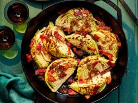 Fried Cabbage with Bacon — Southern Skillet Recipe That's Surprisingly Good for You 14 Southern fried cabbage with bacon in a cast iron skillet, garnished with fresh cracked black pepper and green onions, golden and caramelized