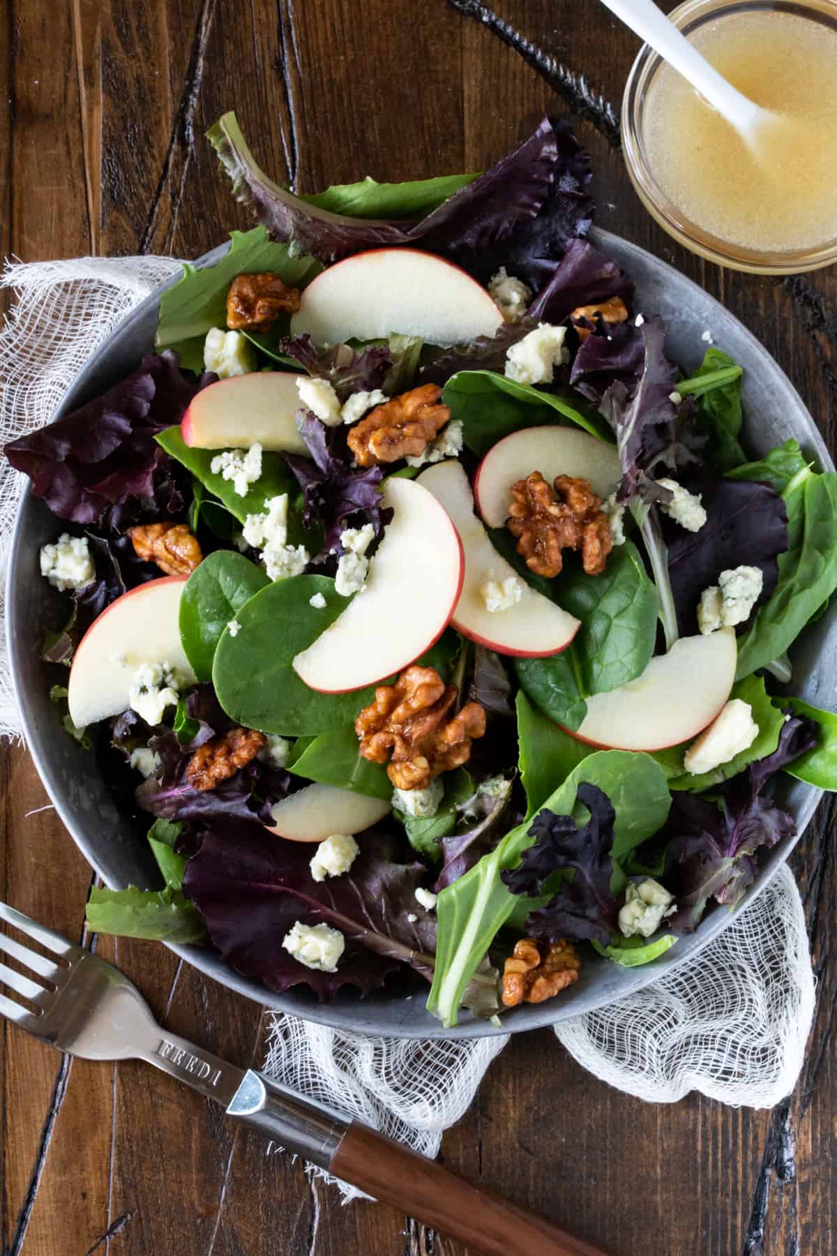 Healthy October Harvest Salad — Crisp, Colorful & Nourishing 10 Healthy October harvest salad with green apple, candied walnuts, blue cheese, and lemon vinaigrette in a large wooden bowl, overhead shot on a rustic autumn table