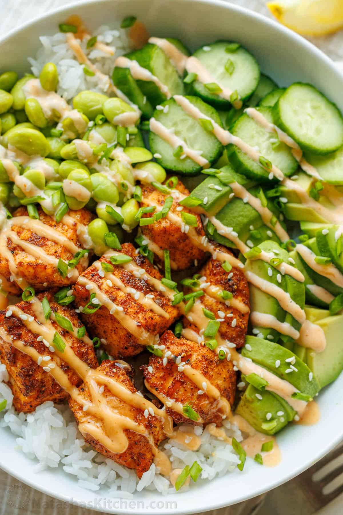 Crispy Air Fryer Salmon Nuggets (Healthy, Easy & Ready in 20 Minutes) 11 two bowls side by side — one filled with seasoned vegan mayo and one with panko breadcrumbs — with raw salmon pieces ready to be coated